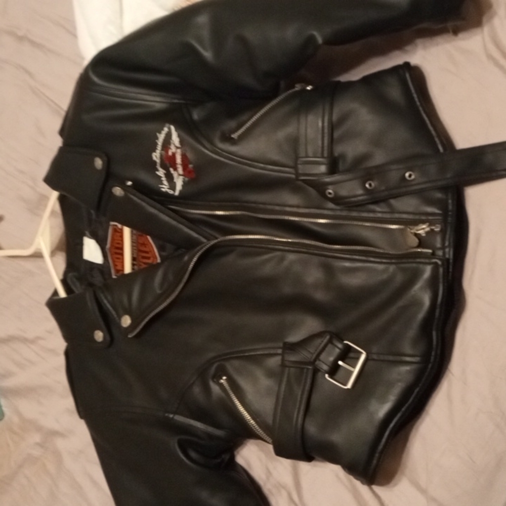Childs size small Harley Jacket. Has zippers and a cute front tie. Like new